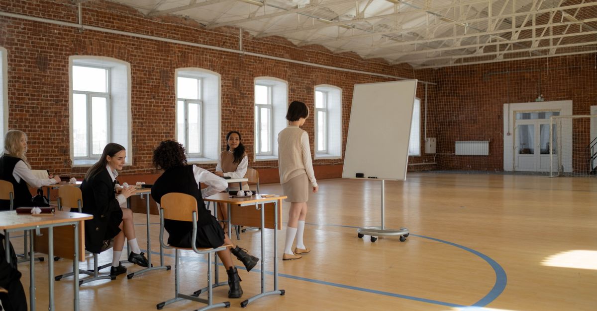 Students in a school hall during an evacuation drill